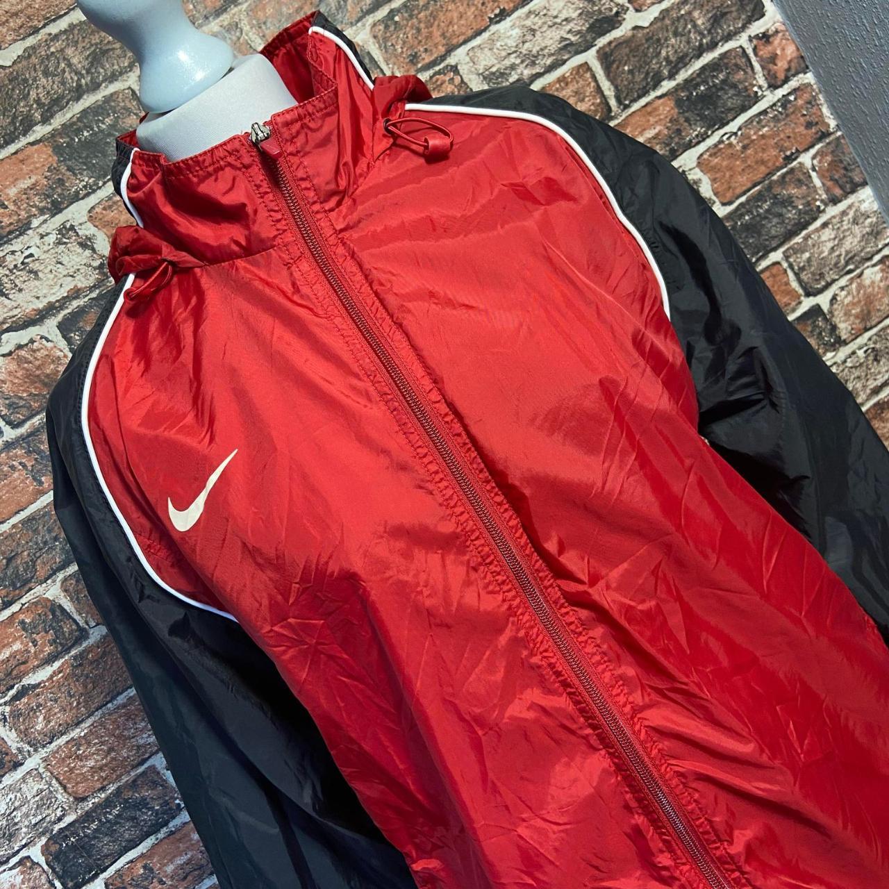 red and black nike coat