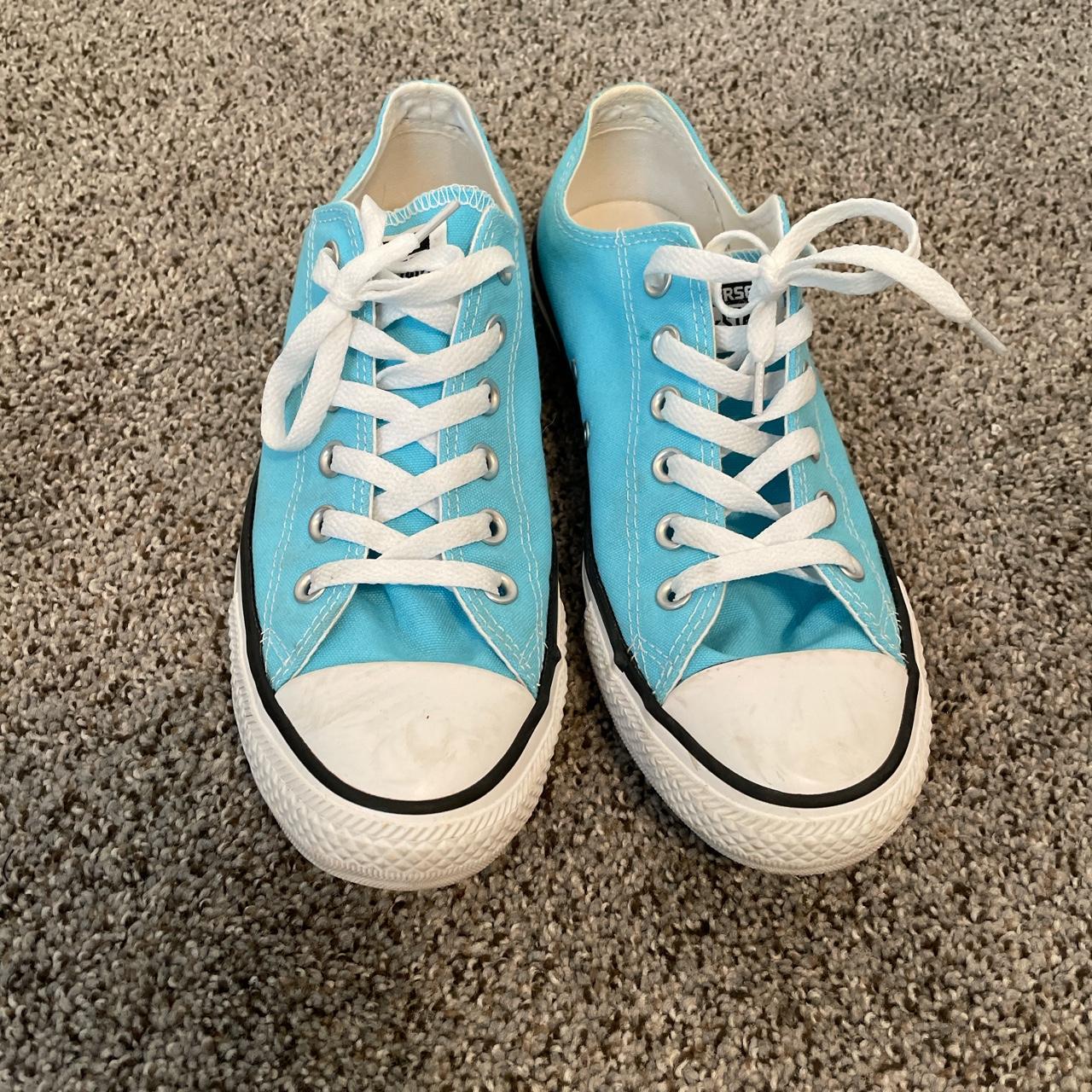 Light blue converse. Size 7 mens or 9 womens. There