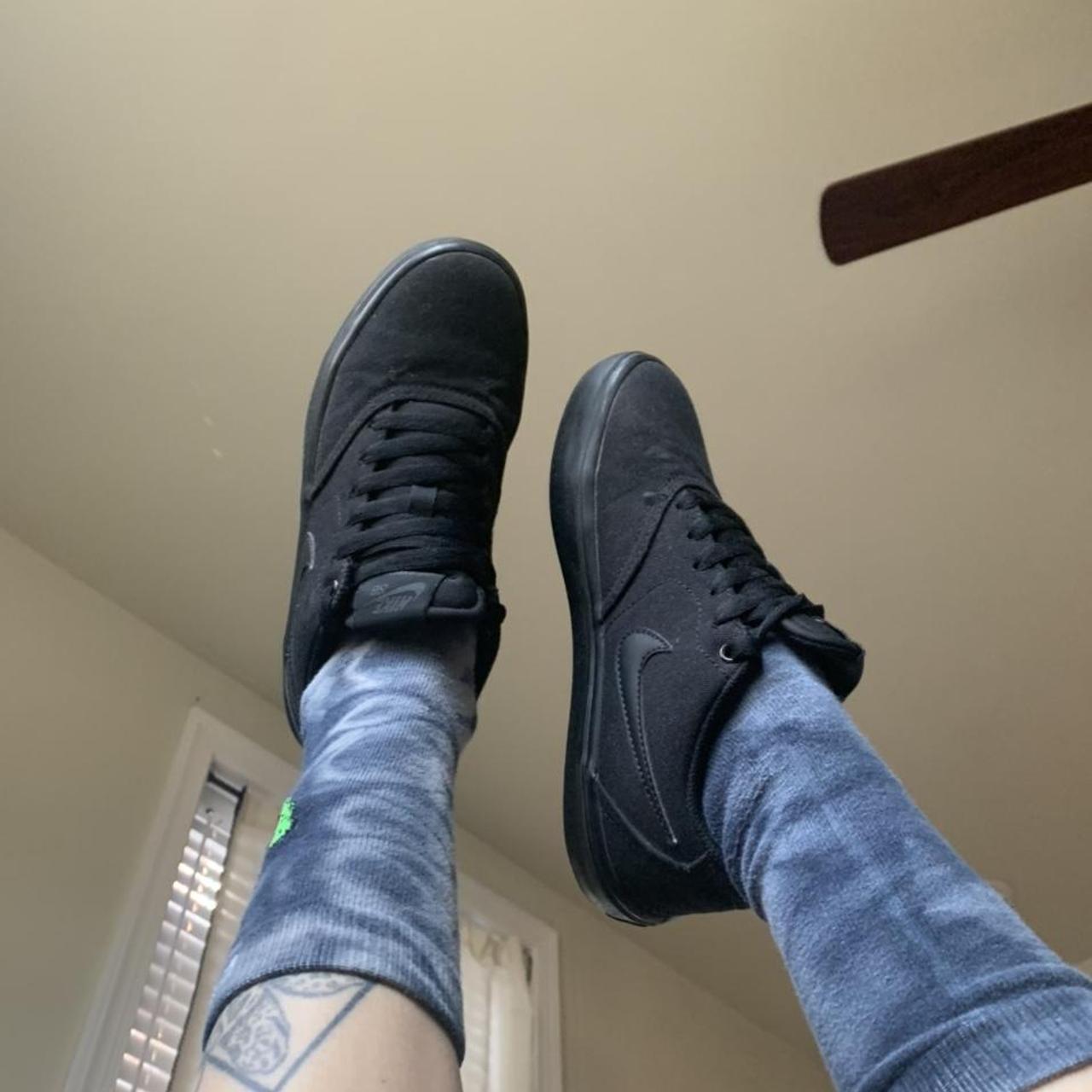 Nike black skate shoes. Narrow fit. Some slight ware... Depop