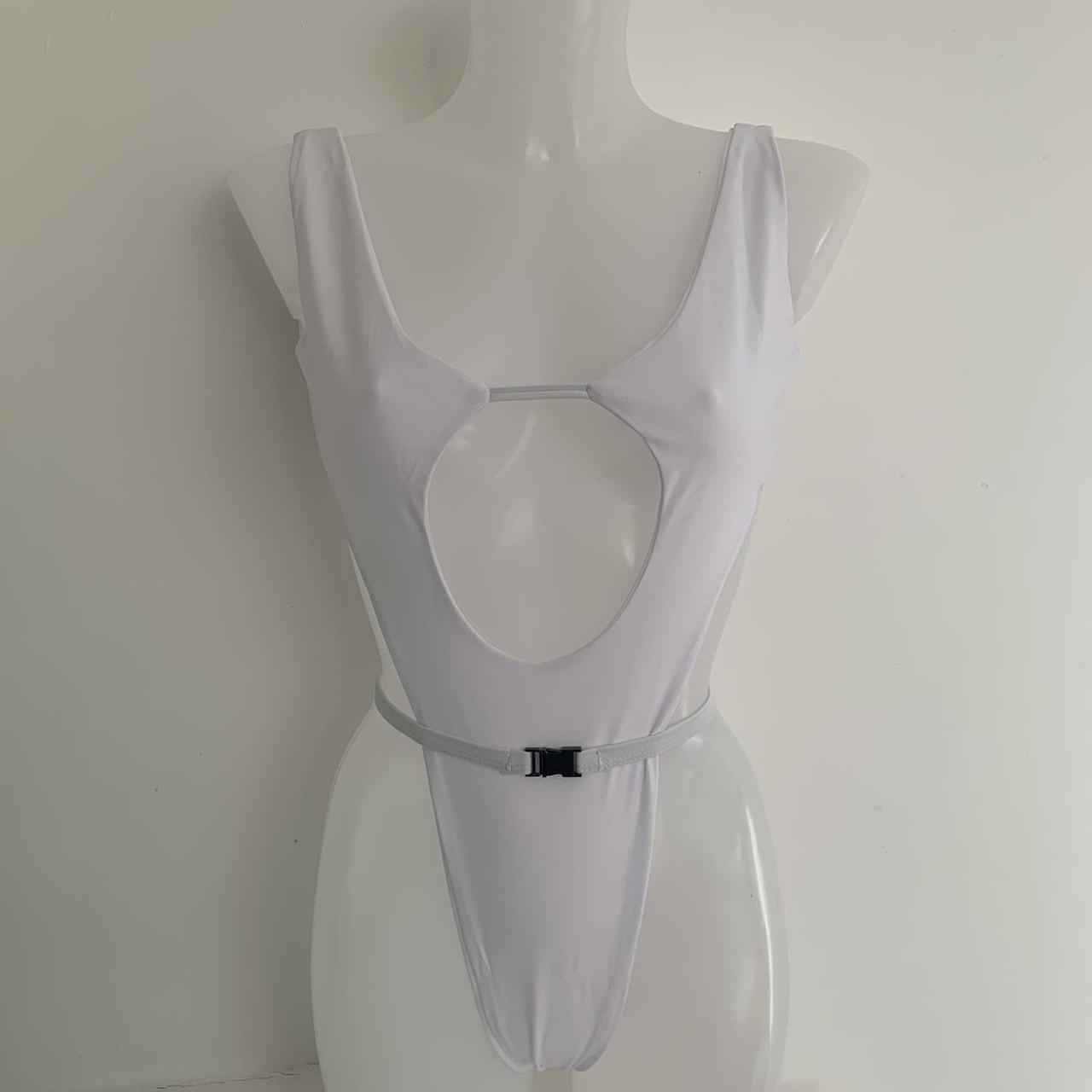 White High leg one piece thong swimsuit with a belt... Depop