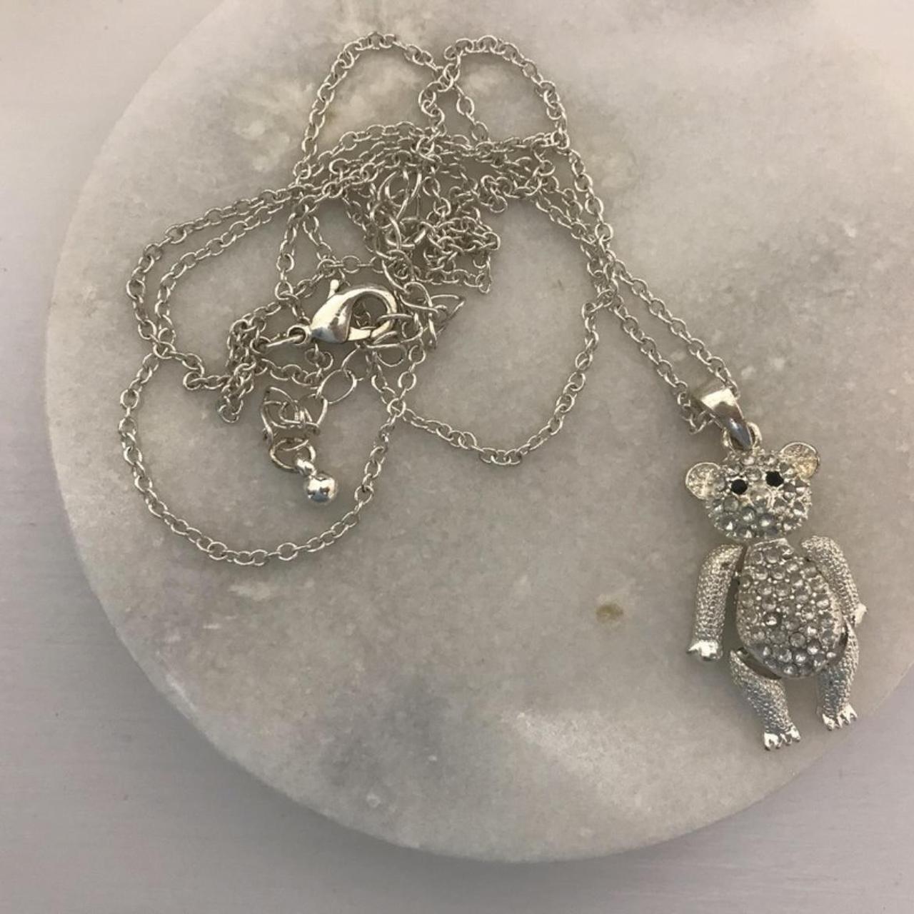 Silver teddy bear pendant necklace with crystal… - Depop