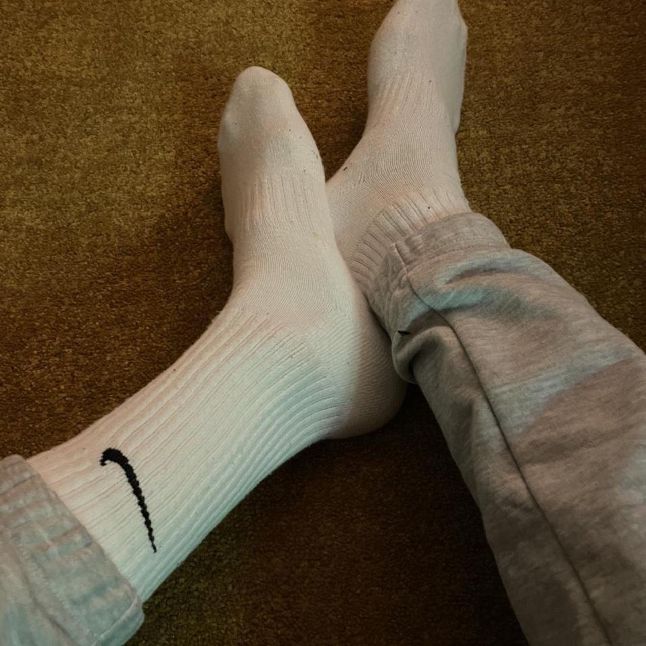 white nike socks on feet
