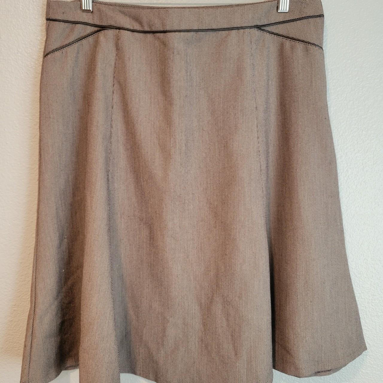 Brown knee length skirt. Piping details, side... Depop