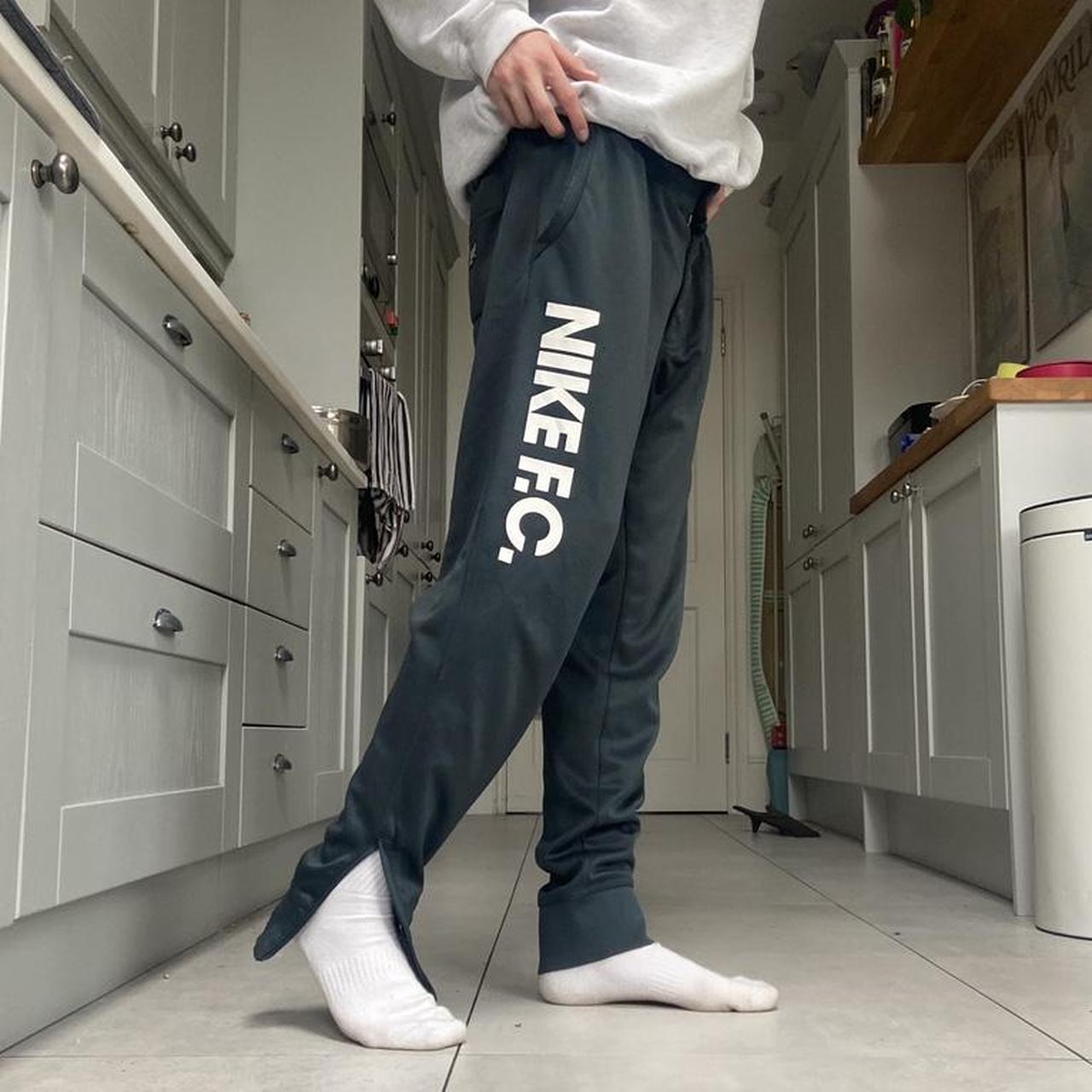 grey nike joggers white tick