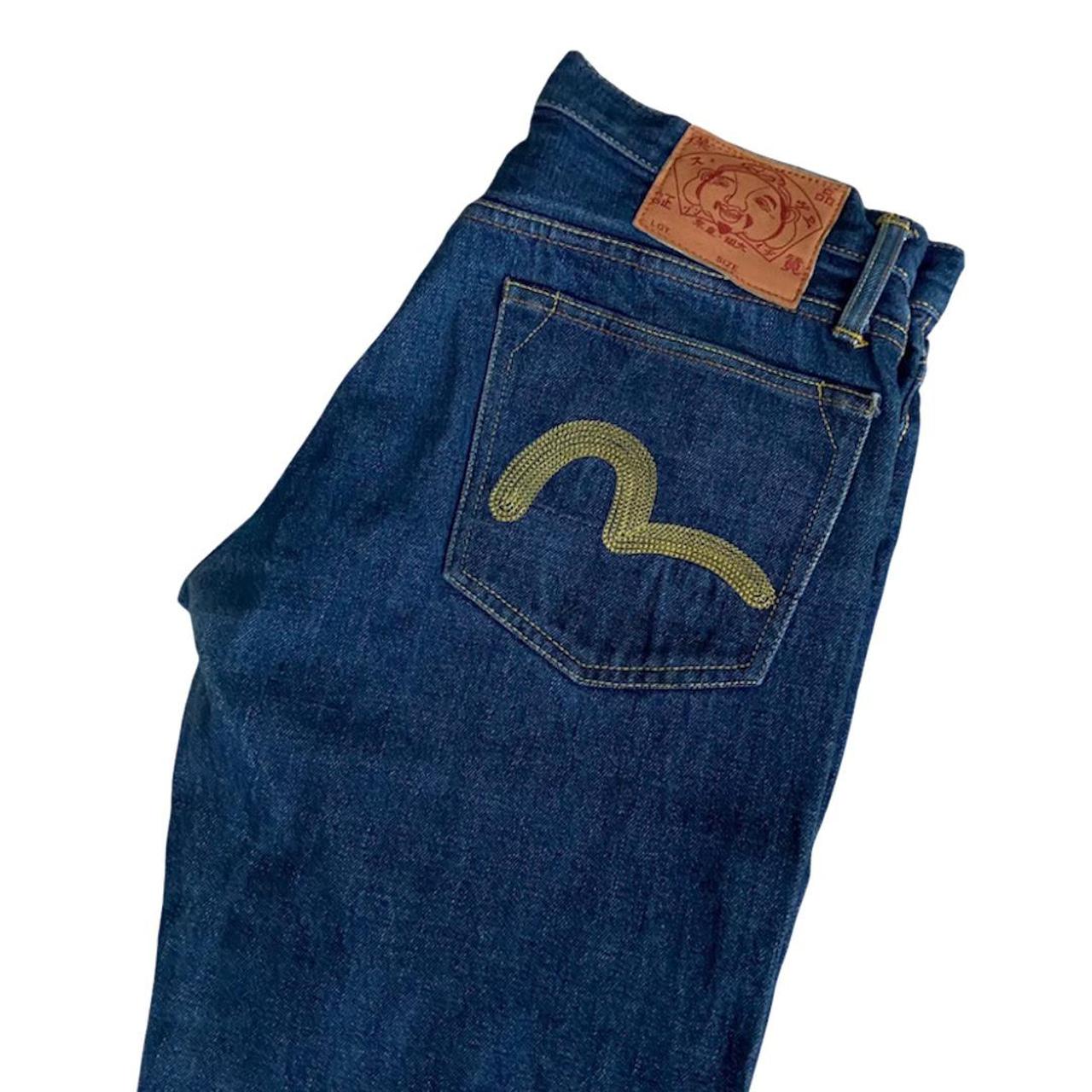 Evisu Jeans with yellow embroidered logo and... - Depop