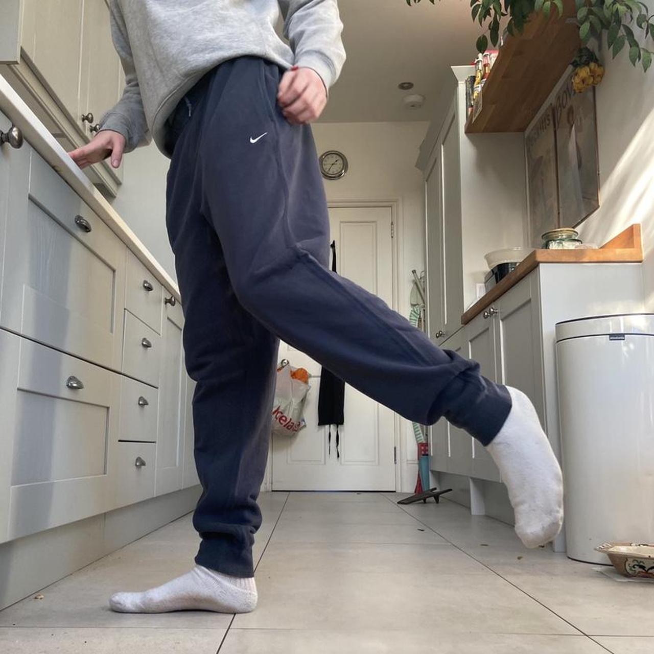 Navy Nike Joggers with adjustable drawstring... Depop