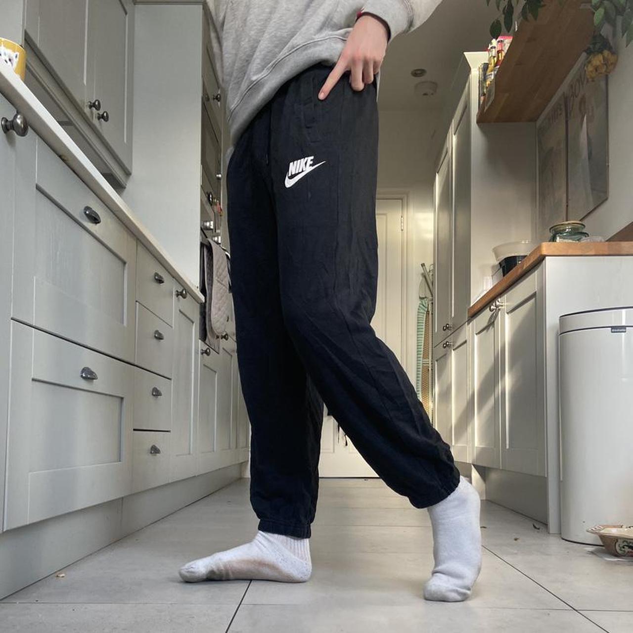 Black Nike Joggers with adjustable drawstring... Depop