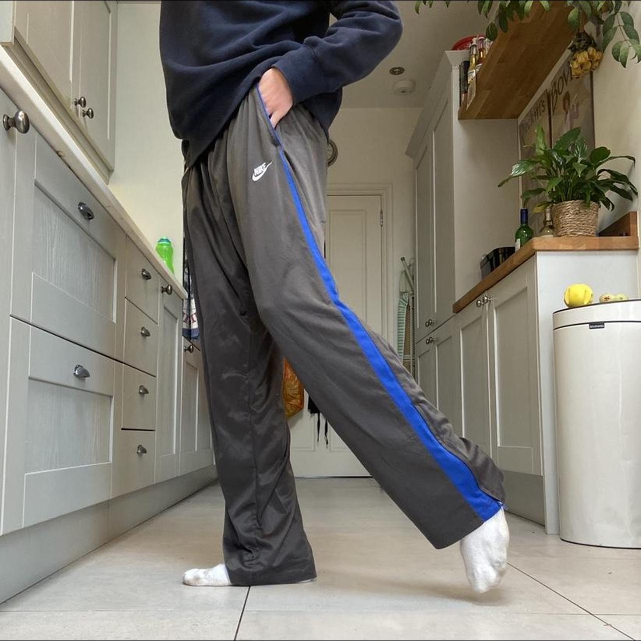 Grey Nike Joggers with adjustable drawstring waist... Depop