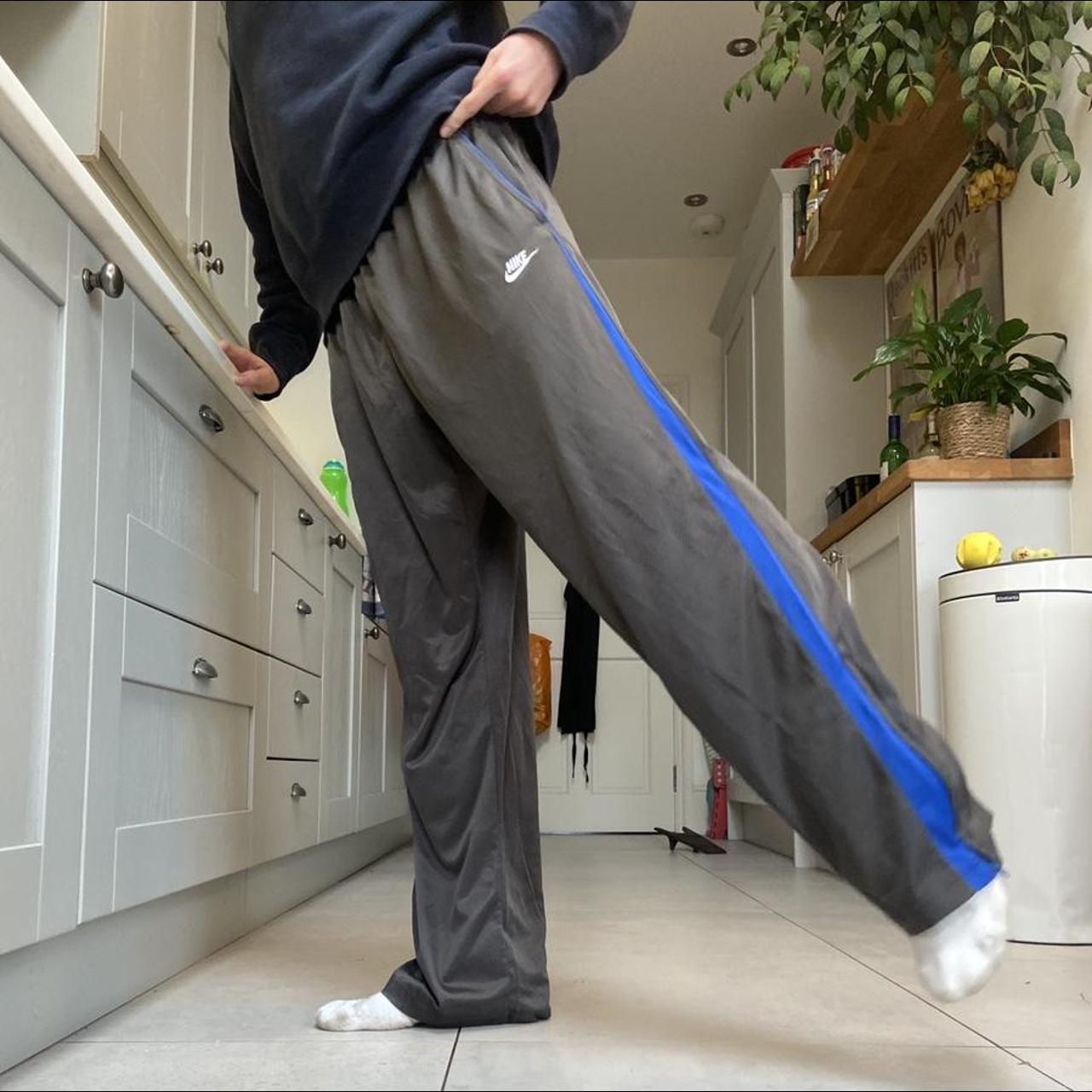 Grey Nike Joggers with adjustable drawstring waist... Depop