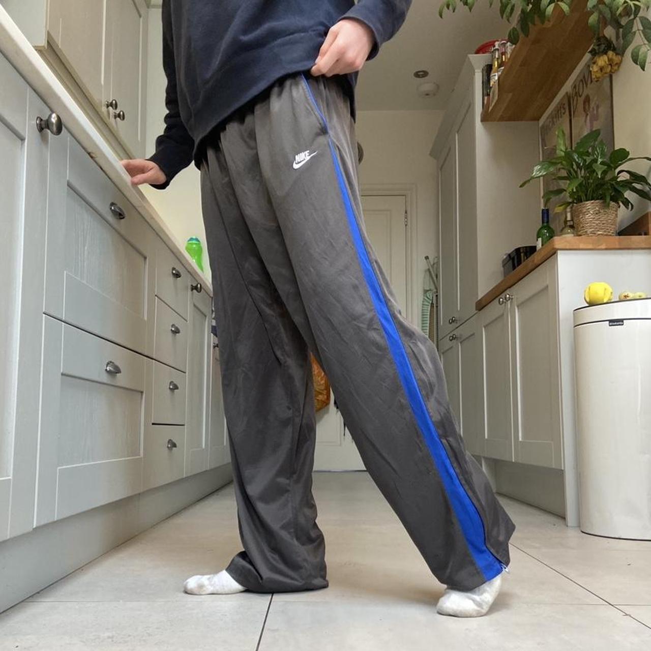 Grey Nike Joggers with adjustable drawstring waist... Depop