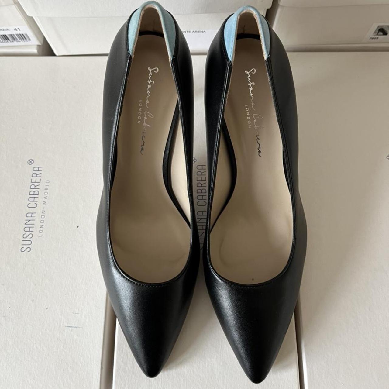 Court shoes in black with blue detail at the back.... - Depop