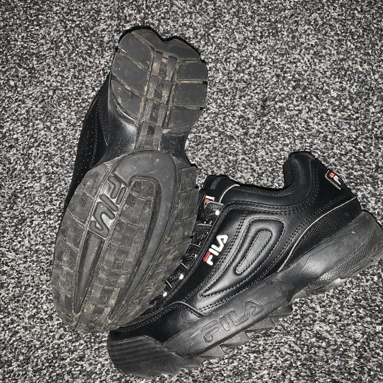 black fila trainers junior