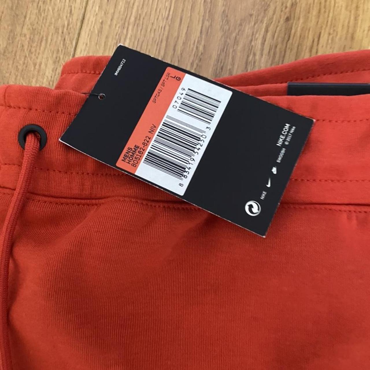 tech fleece joggers red