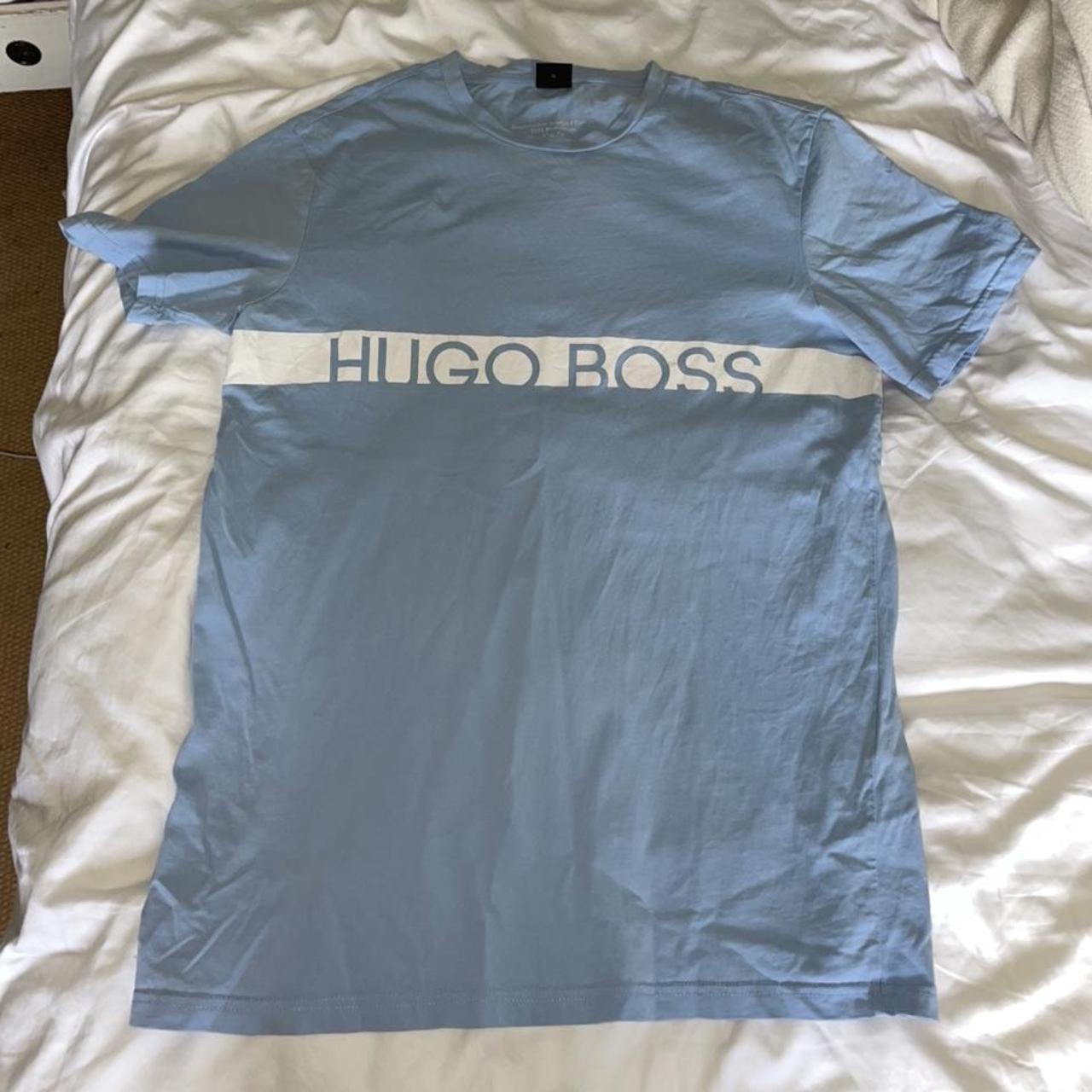 Hugo boss light baby blue Tshirt with white logo... Depop
