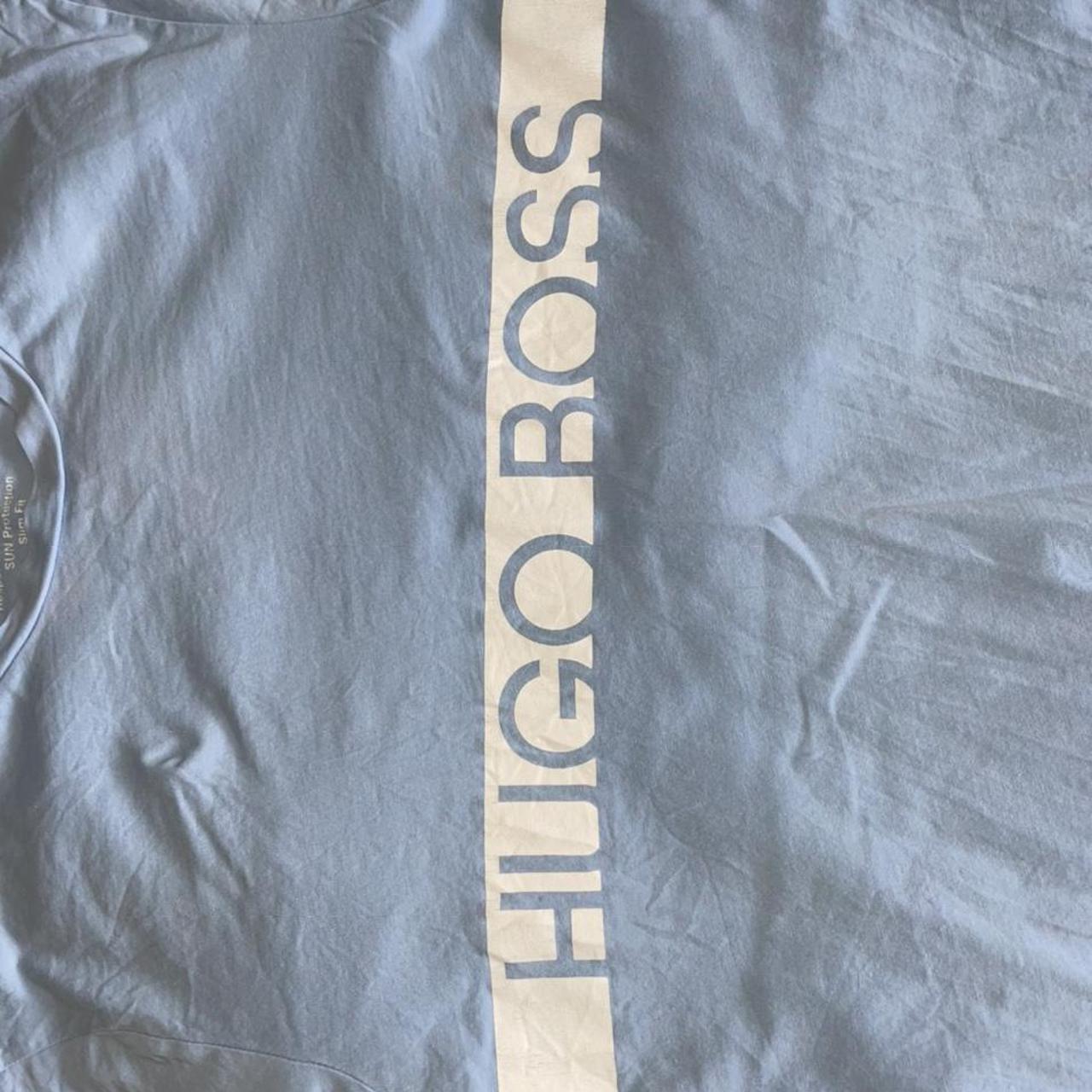 Hugo boss light baby blue T-shirt with white logo... - Depop