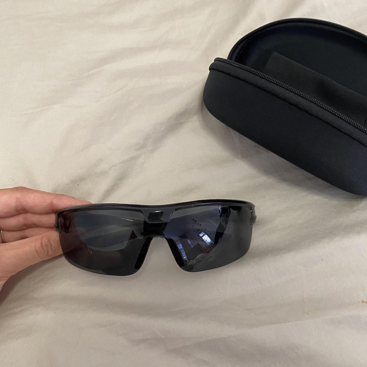 Edgy black sunglasses with case Price: £12 - Depop