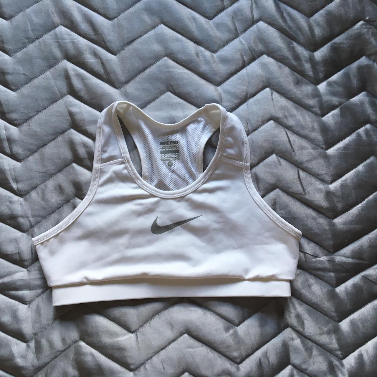 Nike white and light gray sports bra. Nike logo on - Depop