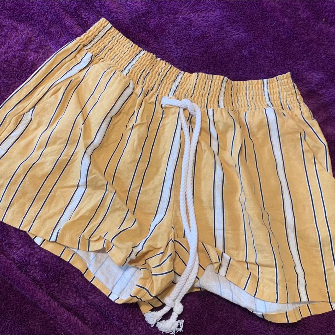 Cute yellow shorts. The waist is very giving and... - Depop