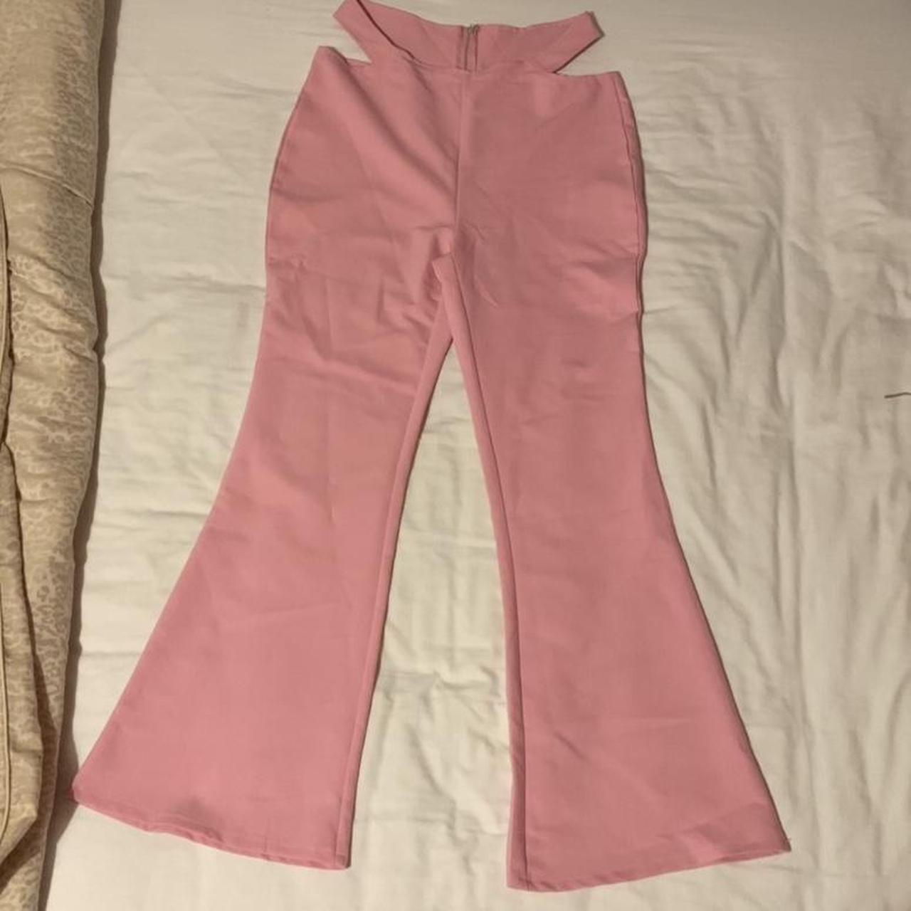 Pink flares with side cutouts and zip at the... - Depop