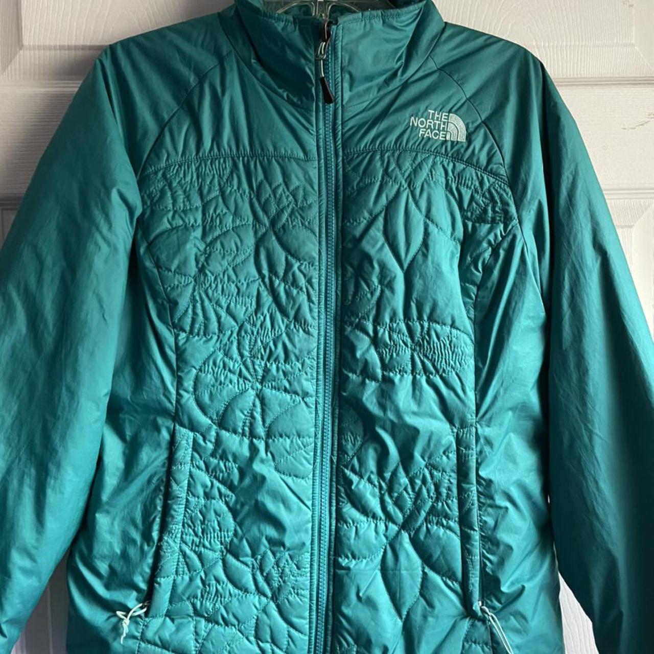 turquoise north face jacket