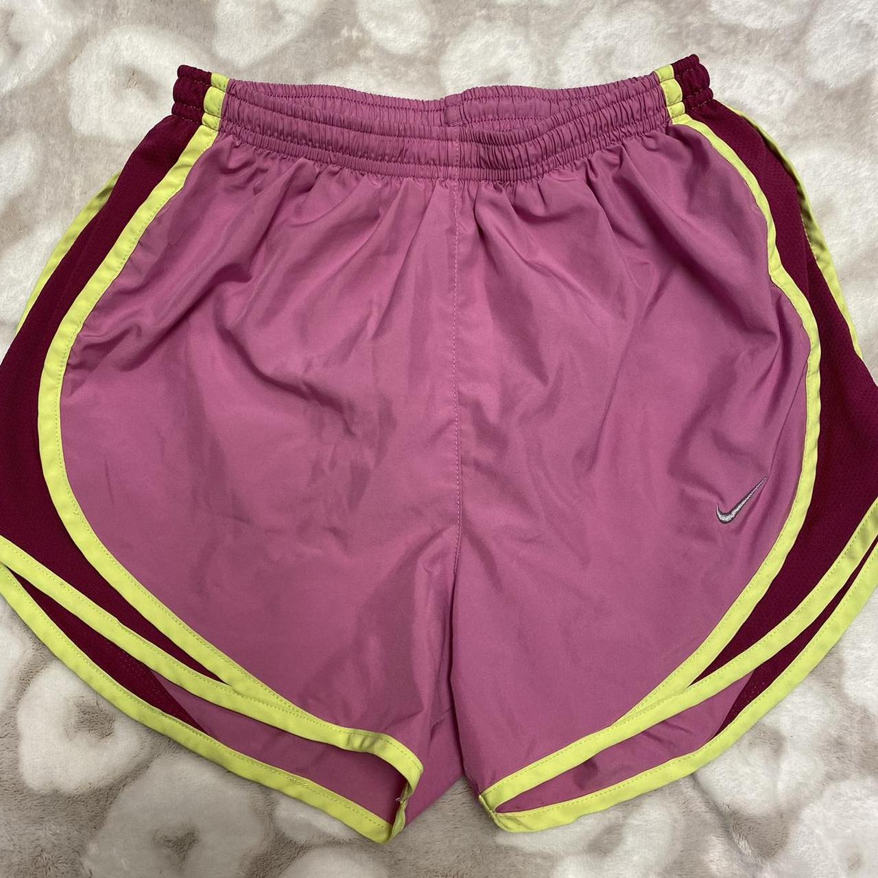 pink and yellow nike shorts