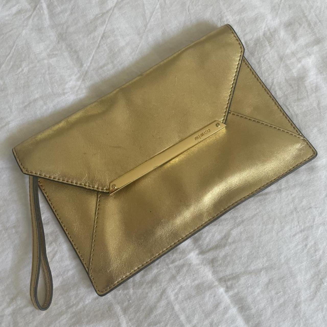 Mimco gold clutch Used a few times - noticeable... - Depop