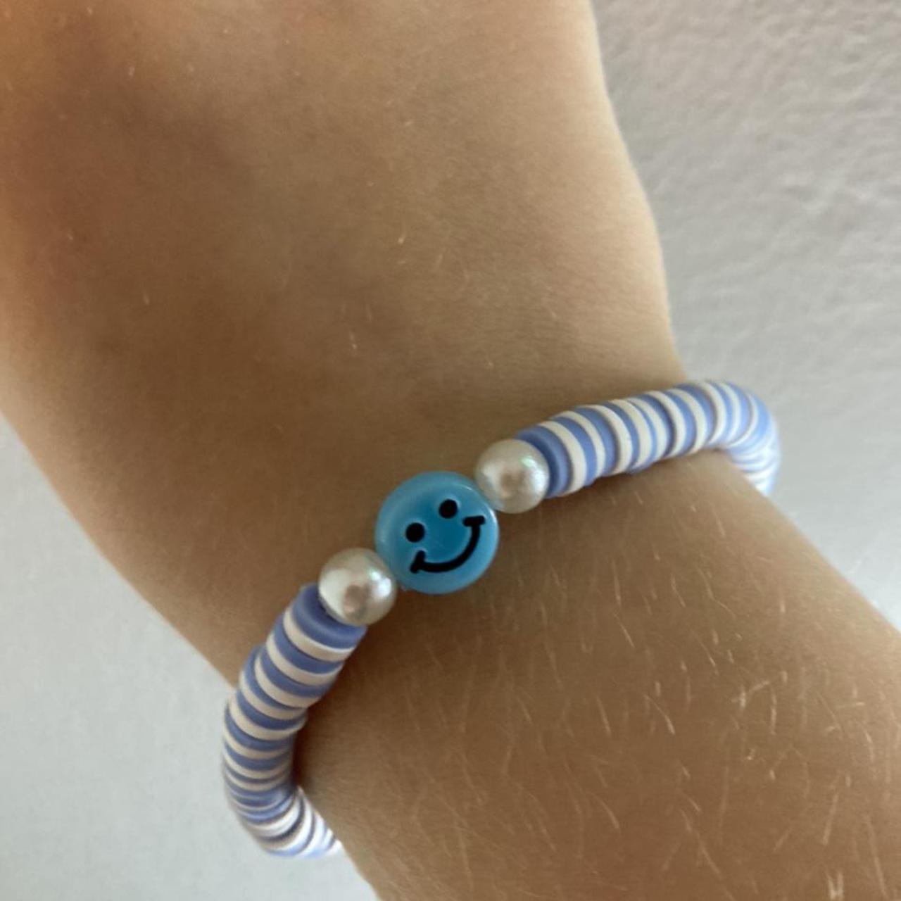 Light blue smiley face clay bead bracelet!... - Depop