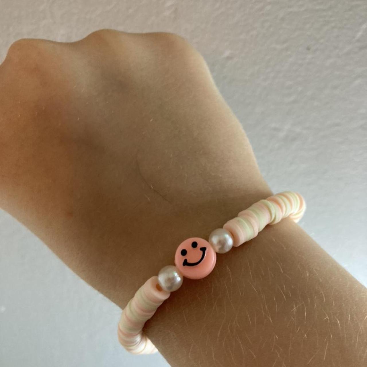 pink nike bracelet