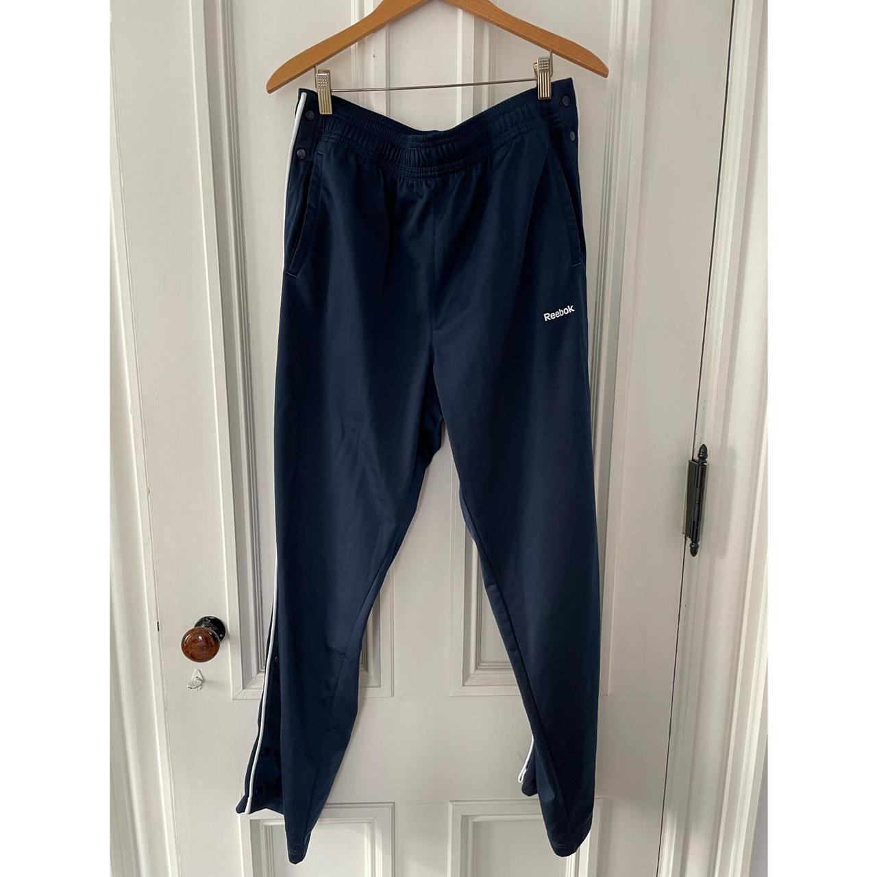 Men’s navy blue Reebok track pants size medium, with