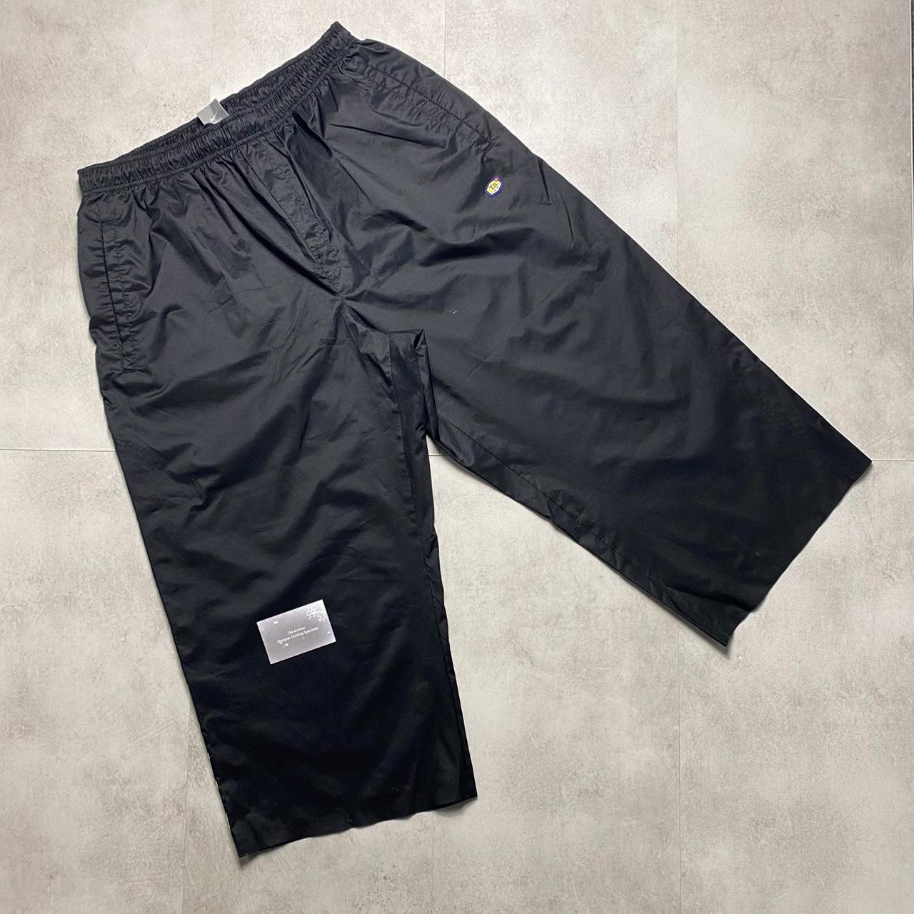 Nike Men's Black and Green Shorts Depop