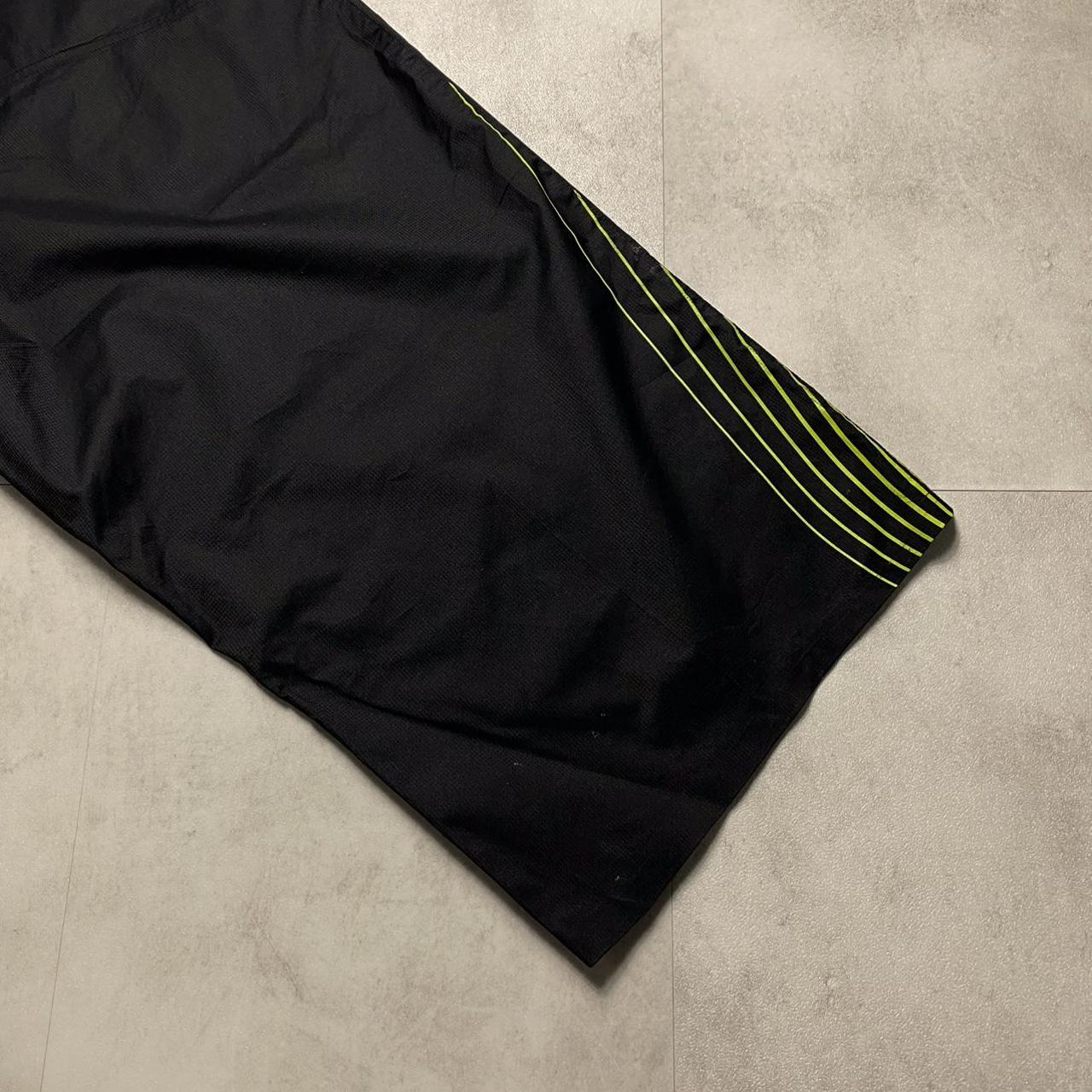 Nike Men's Black and Green Shorts Depop