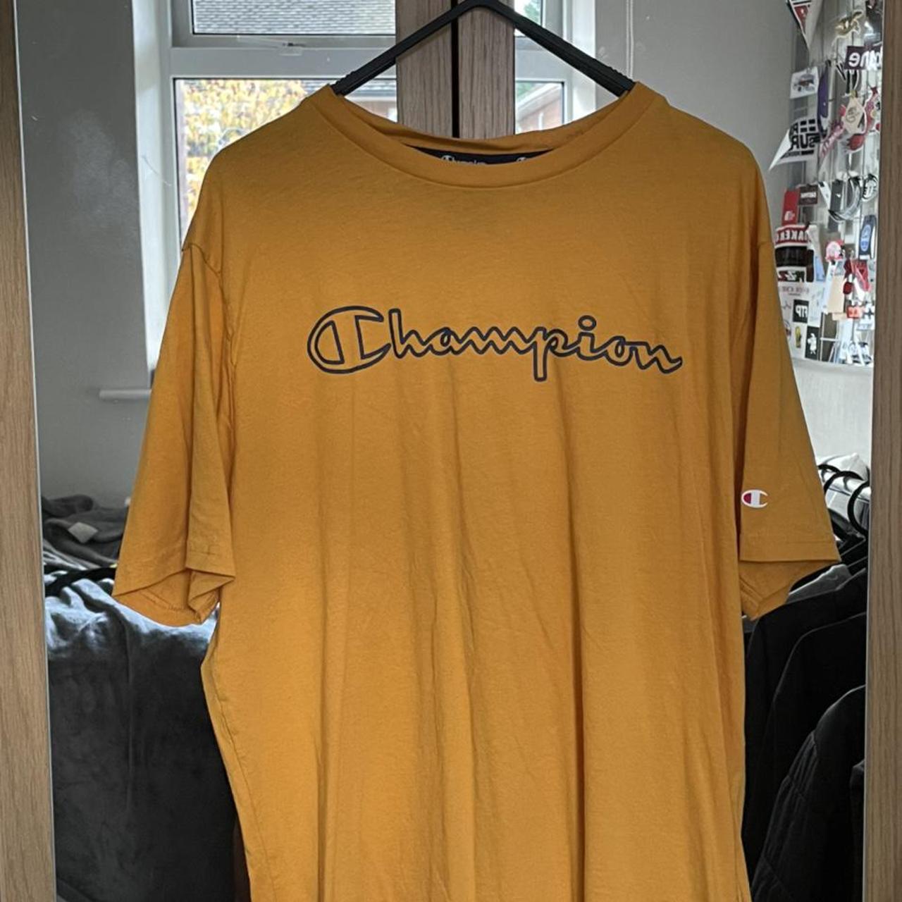 yellow champion tee shirt in excellent condition... - Depop