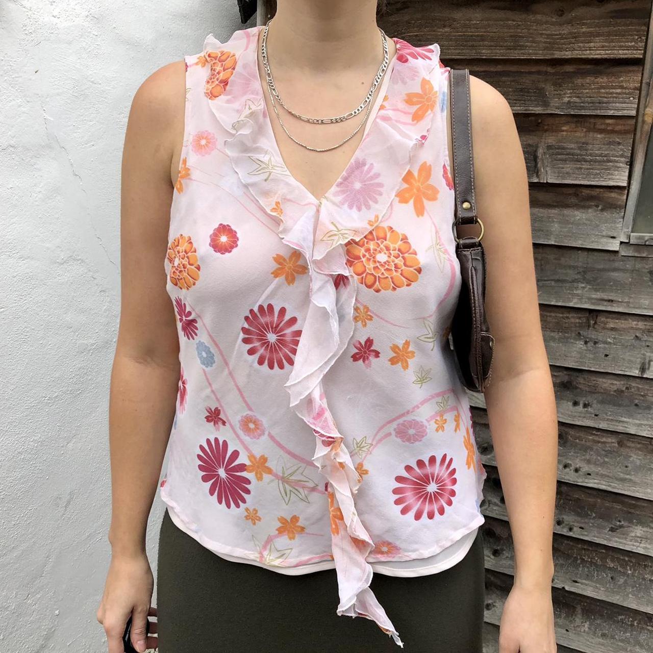 Floral vintage top with orange + pink floral print.... Depop