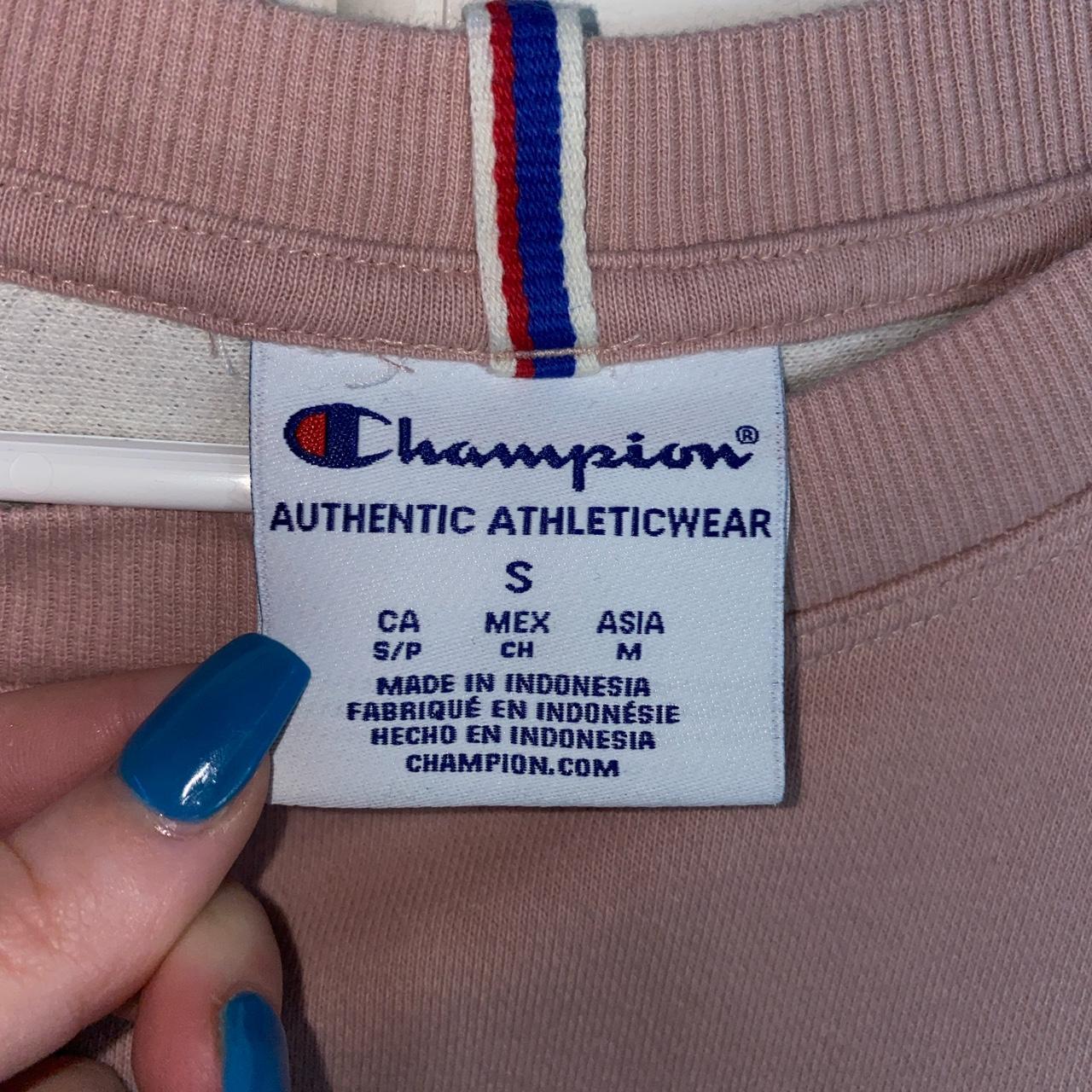 pink champion crewmeck with beige detail. great... - Depop