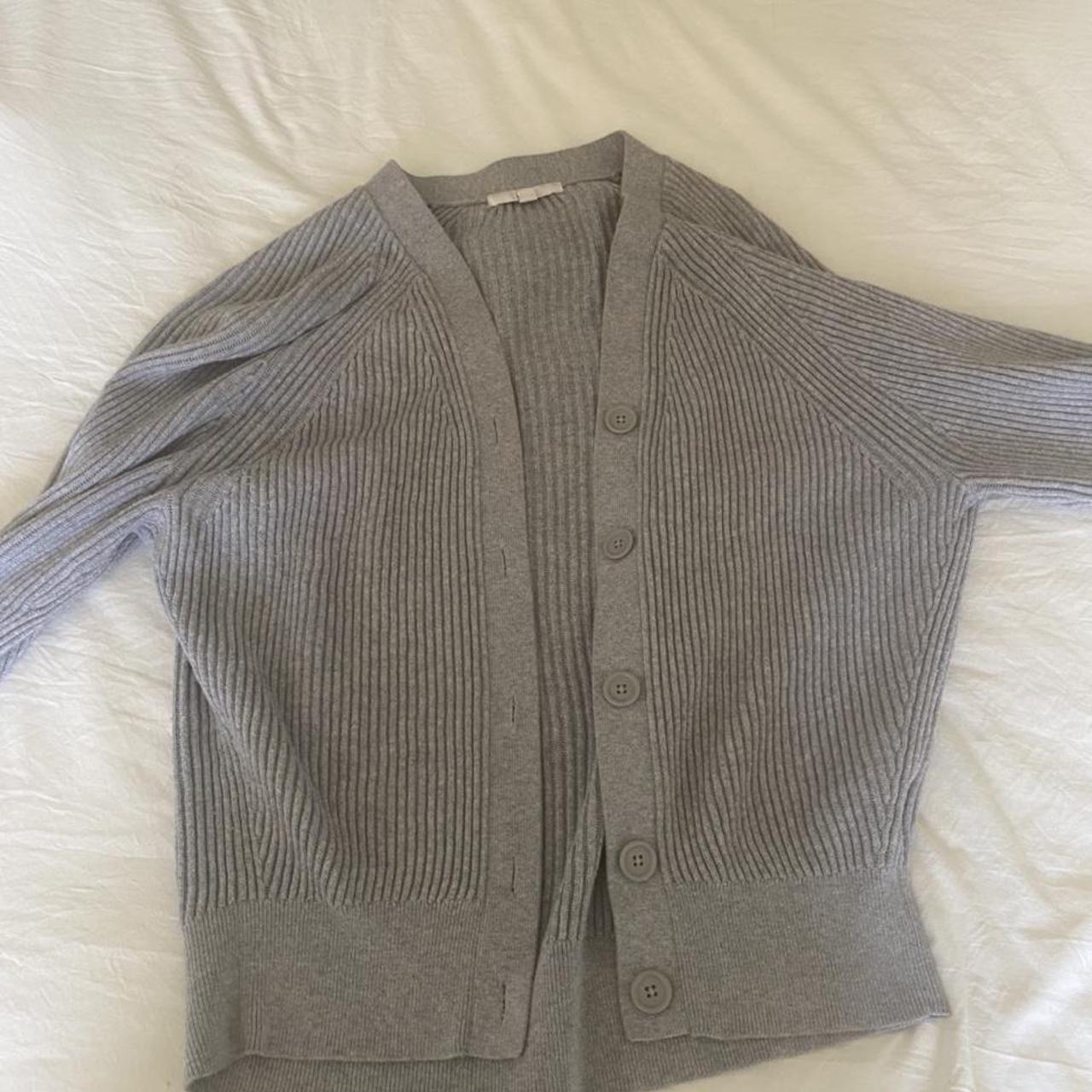 ribbed gray cardigan with a slight pink tinge along... - Depop