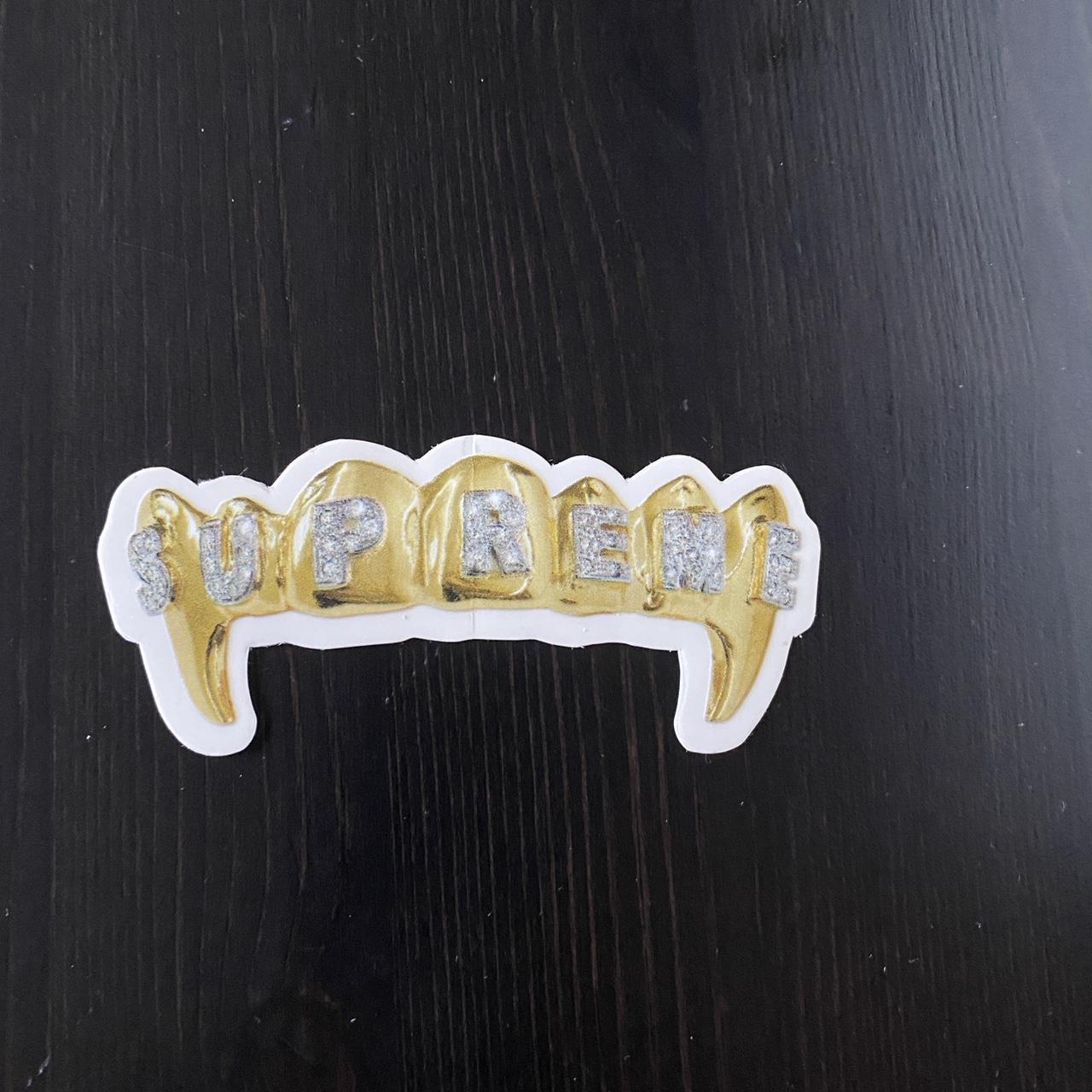 Gold 2025 supreme sticker