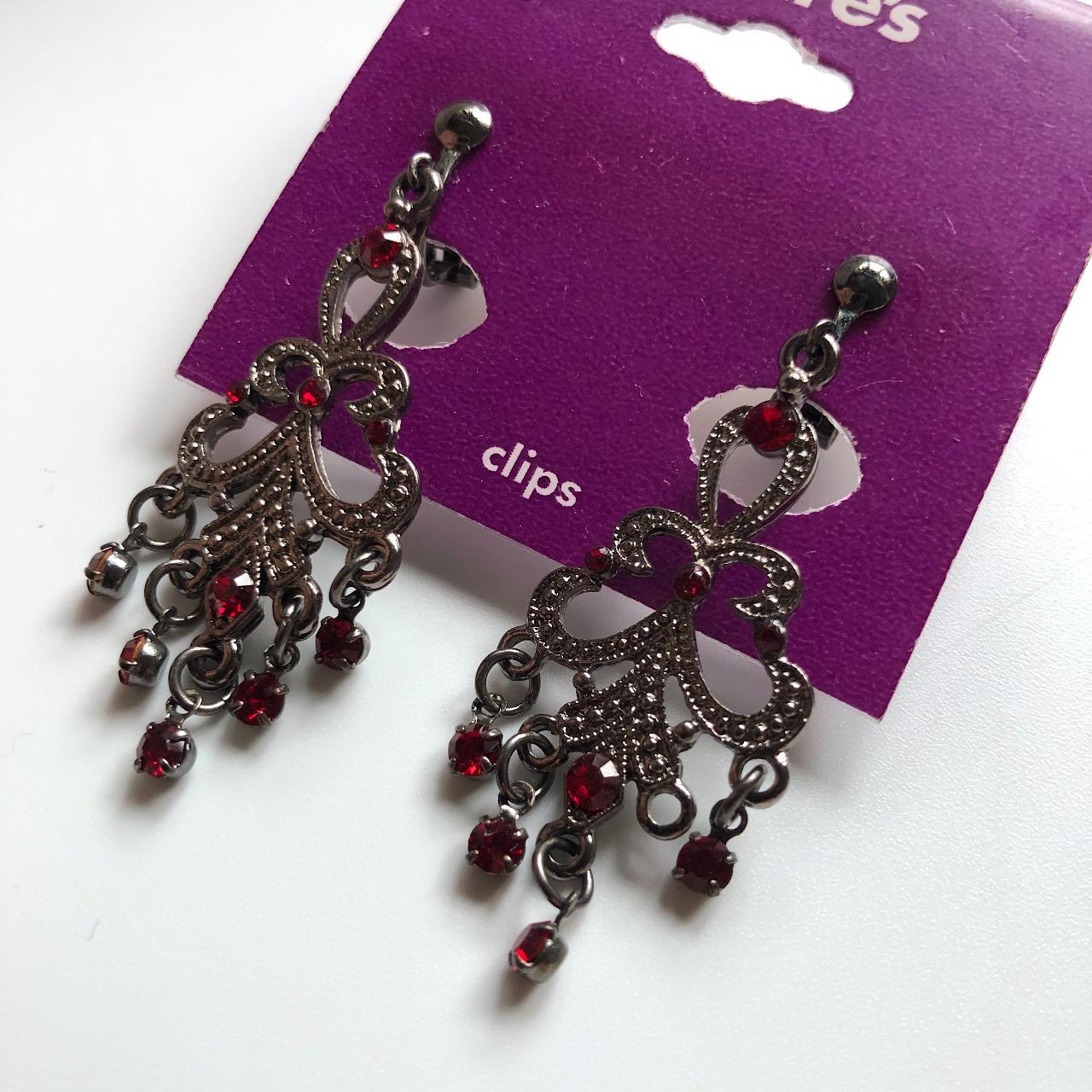 Clip on earrings with vintageinspired dangles. One... Depop