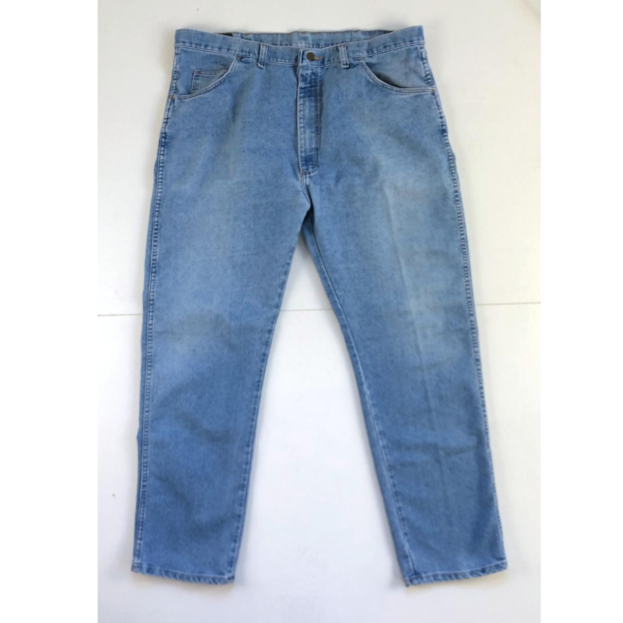Faded blue jeans by Wrangler. Button waist, zip fly.... - Depop