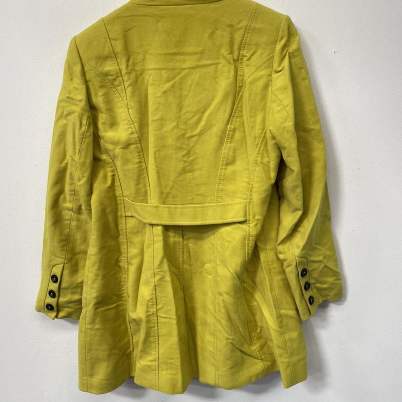 P401 Lovely yellow trench coat from Marks and... - Depop