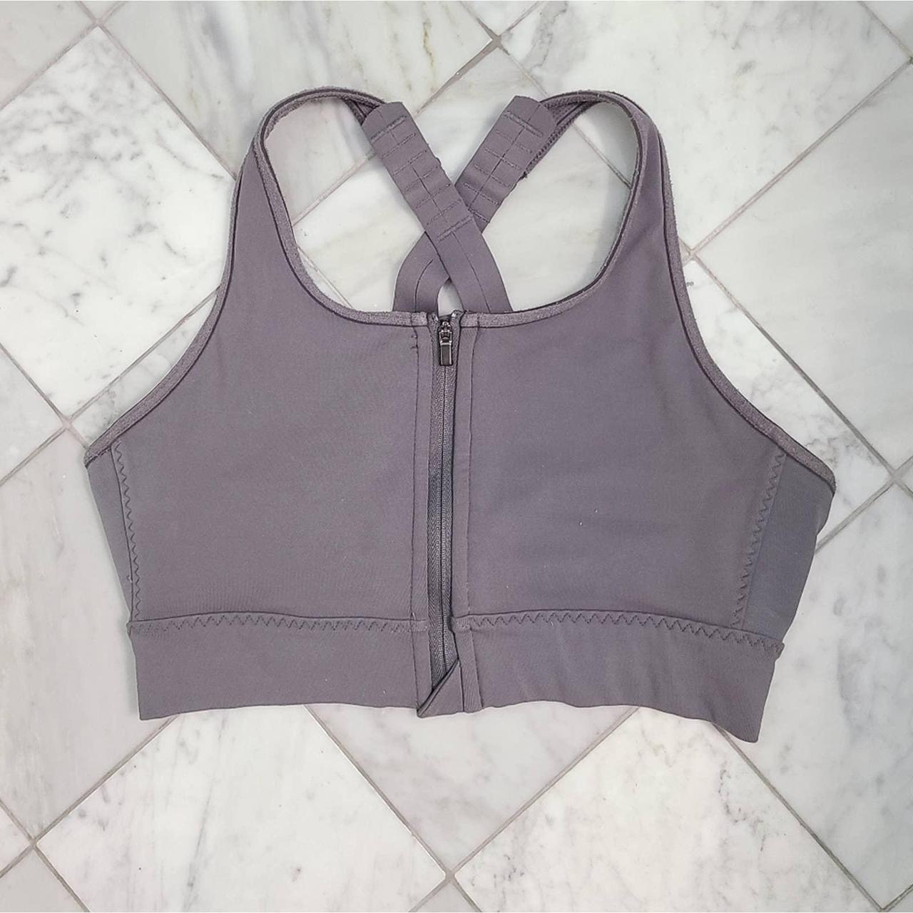 Athleta sports bra with zipper front and racerback... - Depop