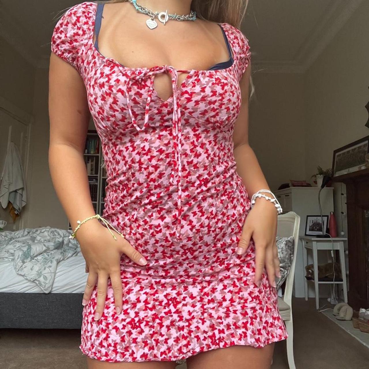 motel rocks mini butterfly dress, selling as a... Depop