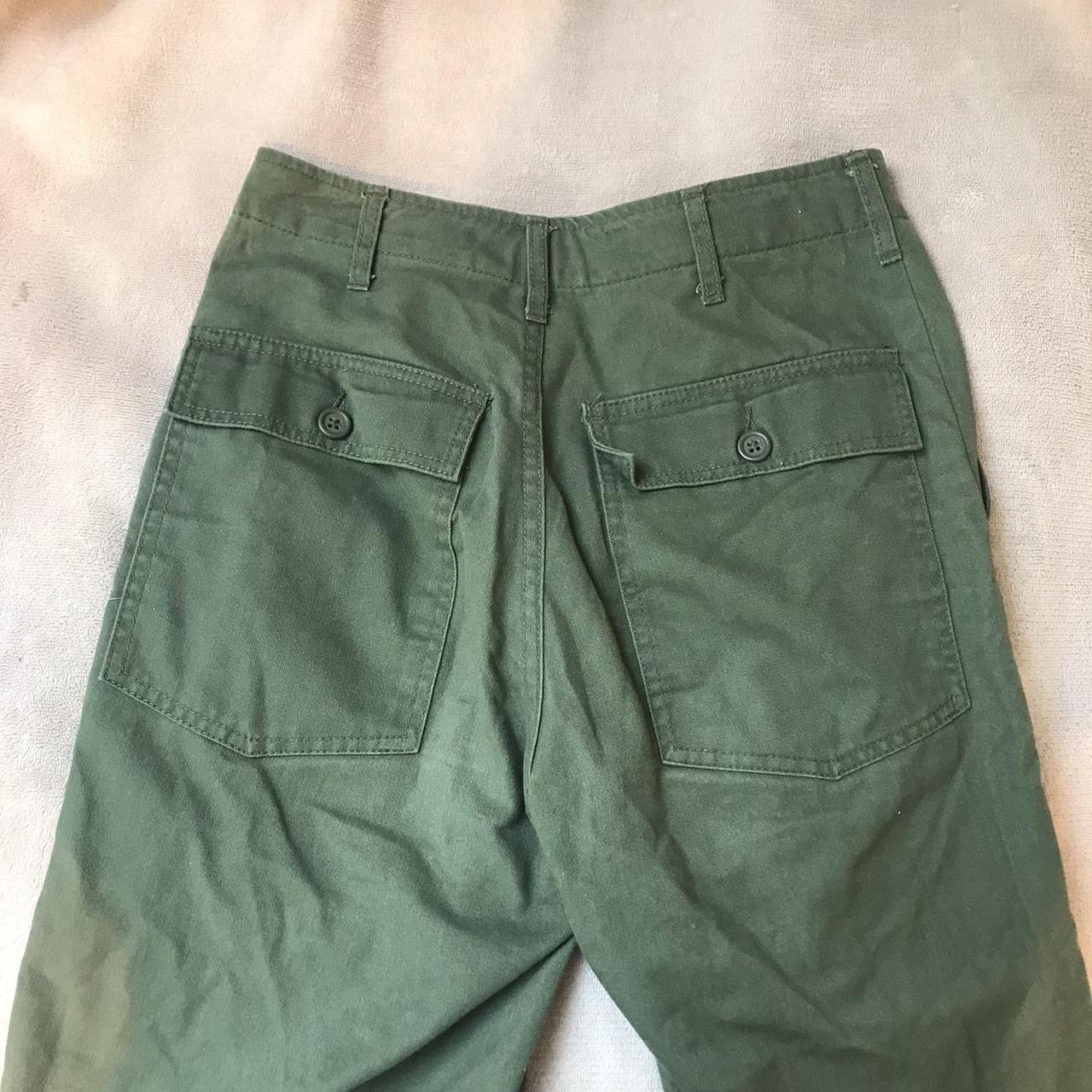 khaki green brandy melville cargo pants. in great... Depop