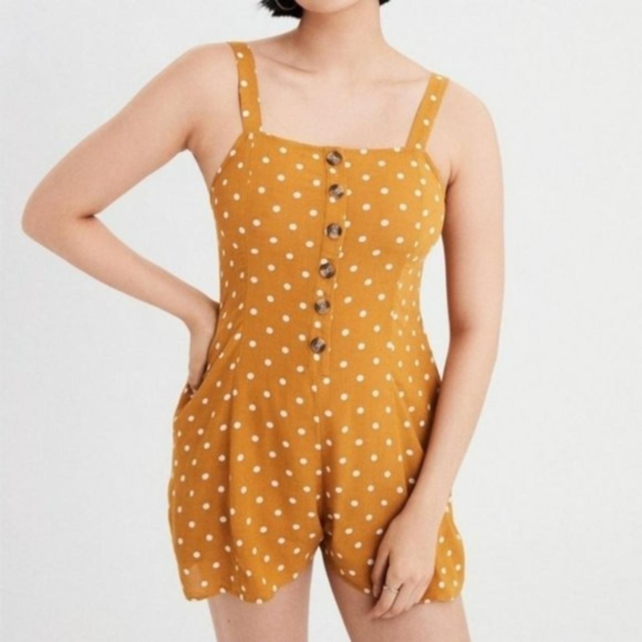 Mustard yellow romper with white polka dots and... Depop