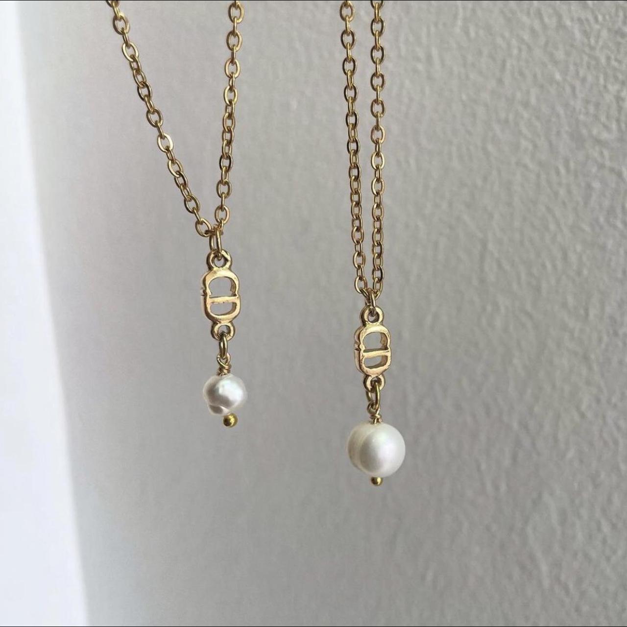 Gold CD Pearl Drop Necklace, made with authentic... - Depop