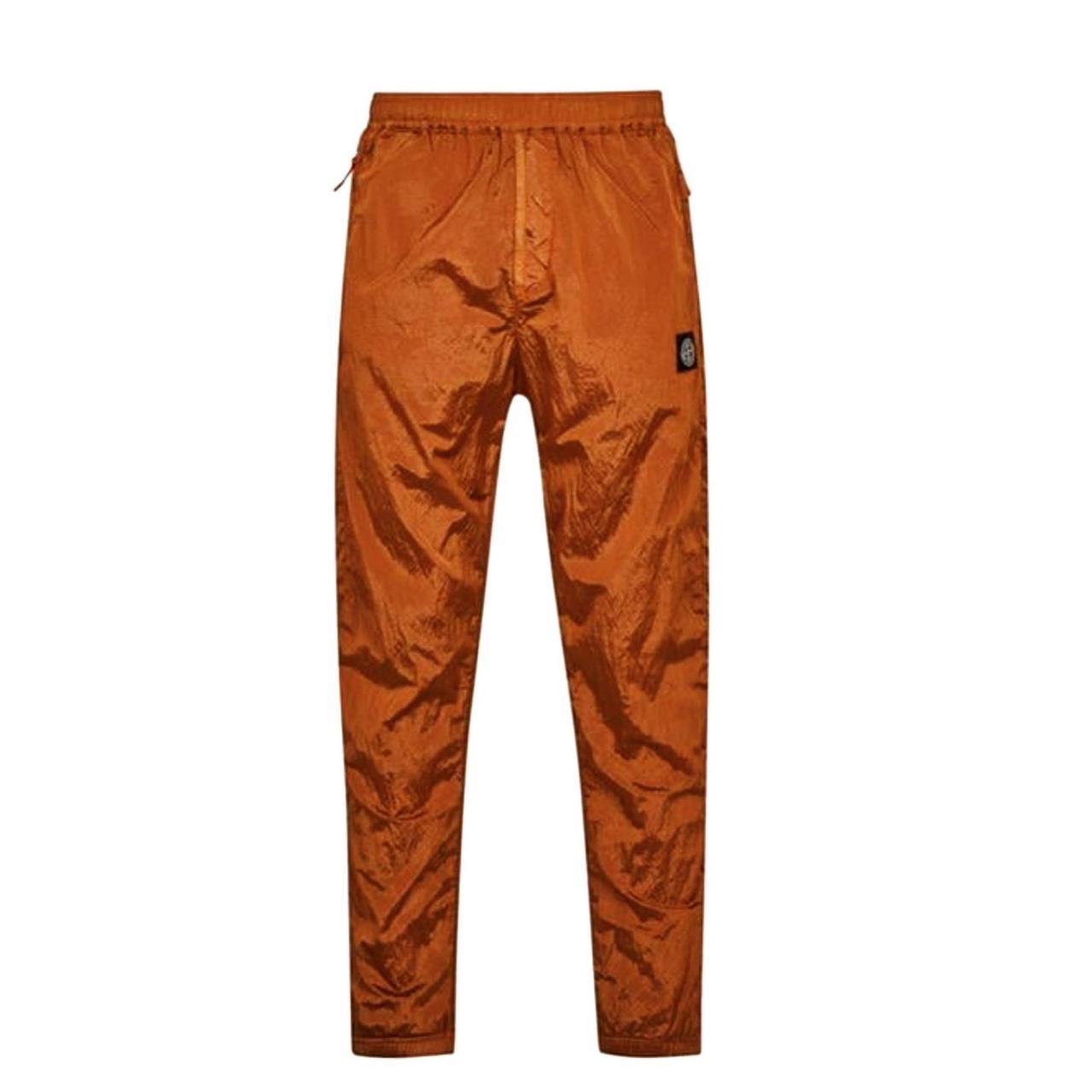 orange stone island pants