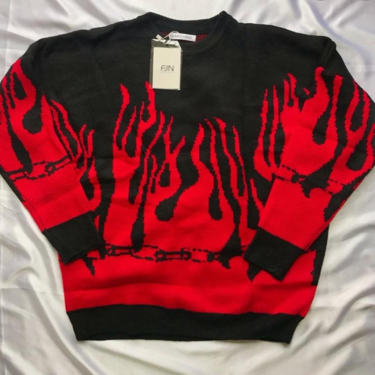 black sweater with red flames