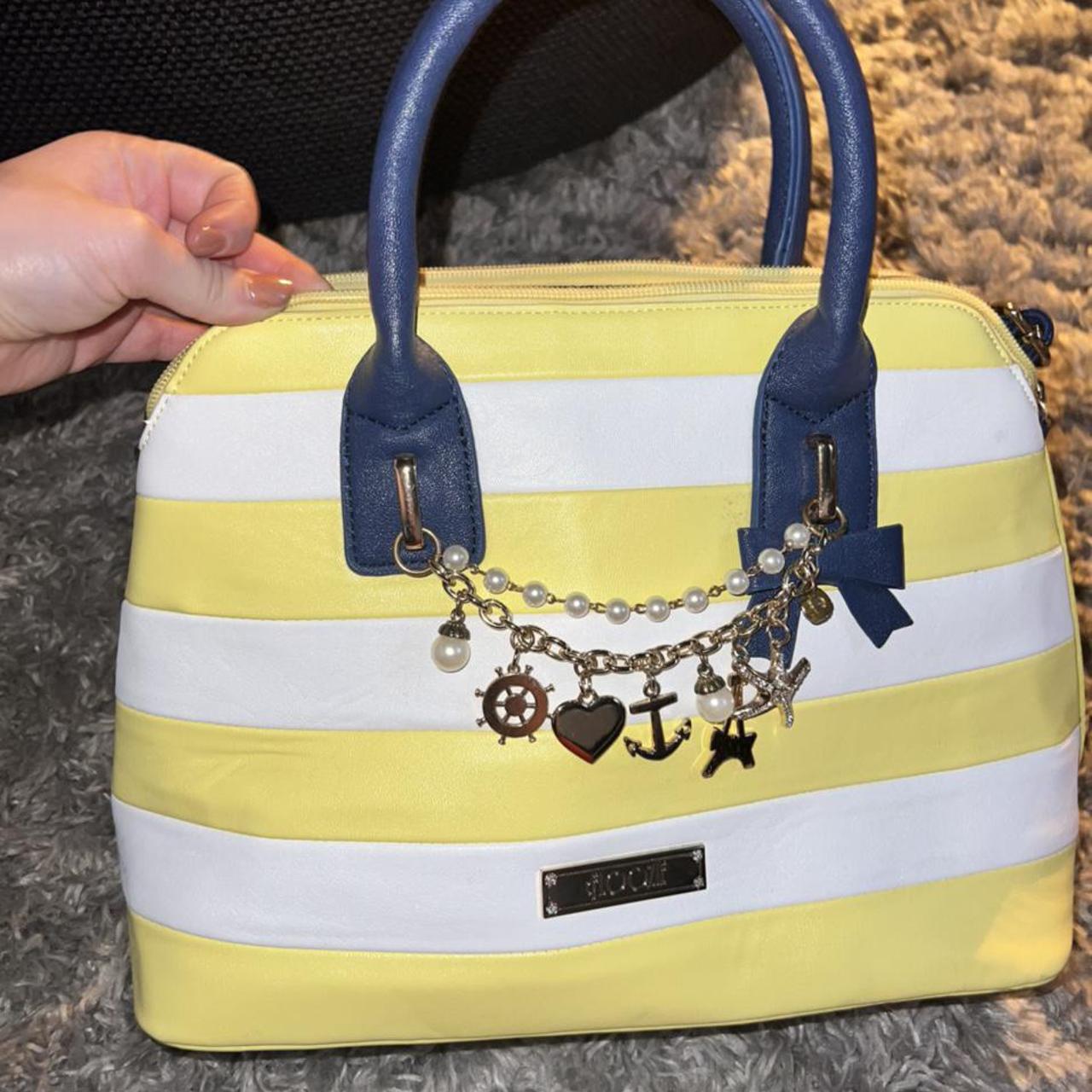 Debenhams store yellow bag