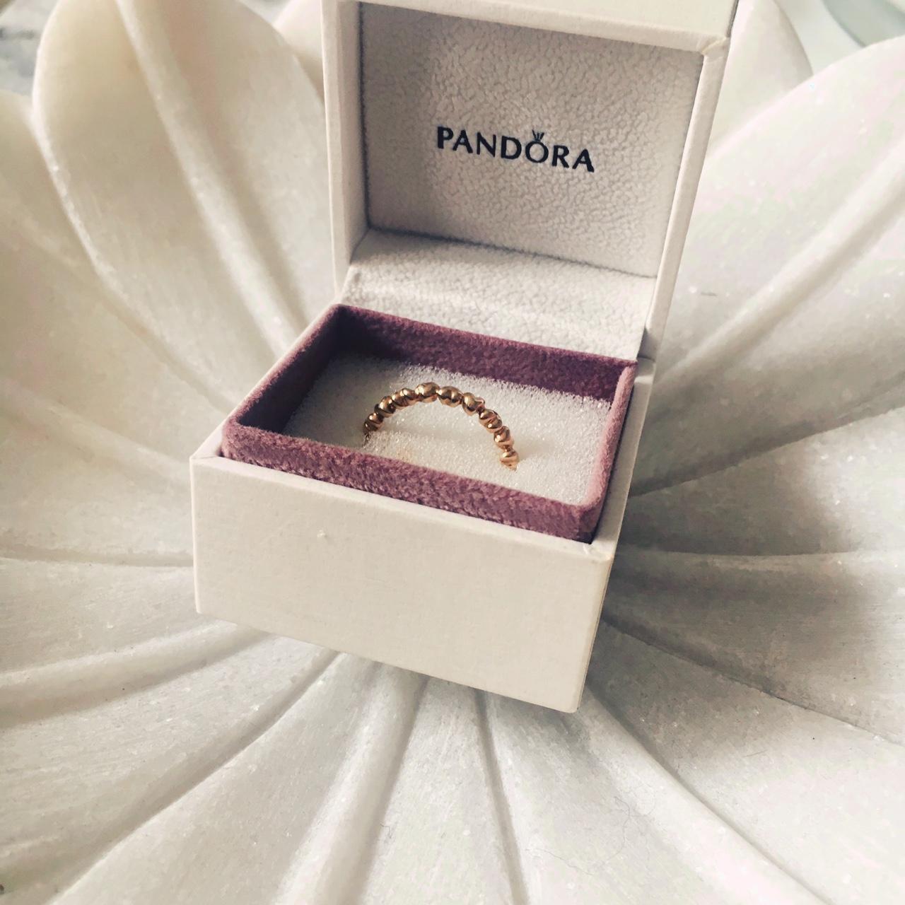 Pandora gold heart stacking ring. Unsure of Size Depop