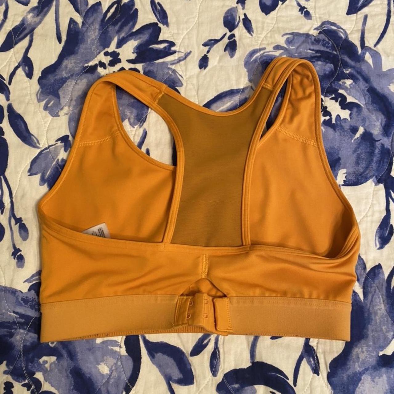 small orange gymshark sports bra worn once, - Depop