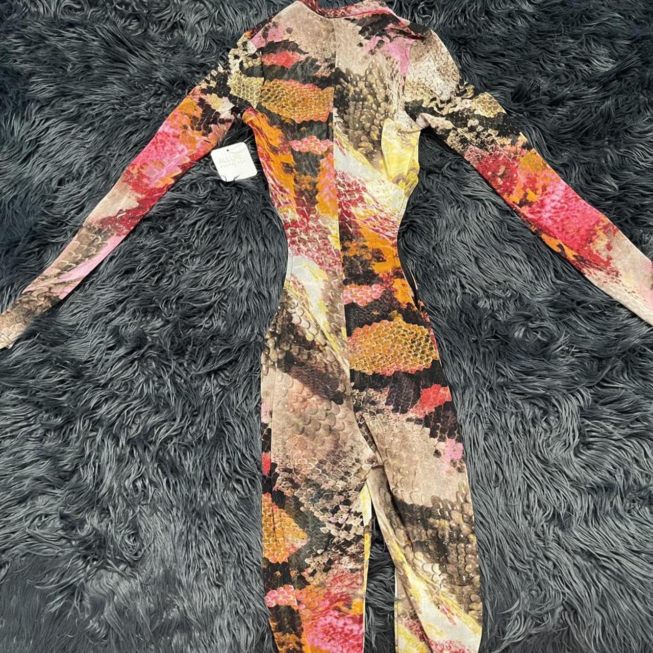 Boutique Bodysuit with side cutouts Snake... Depop